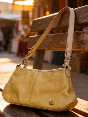 The Sak leather shoulder bag purse yellow marigold leather silver hardware zip